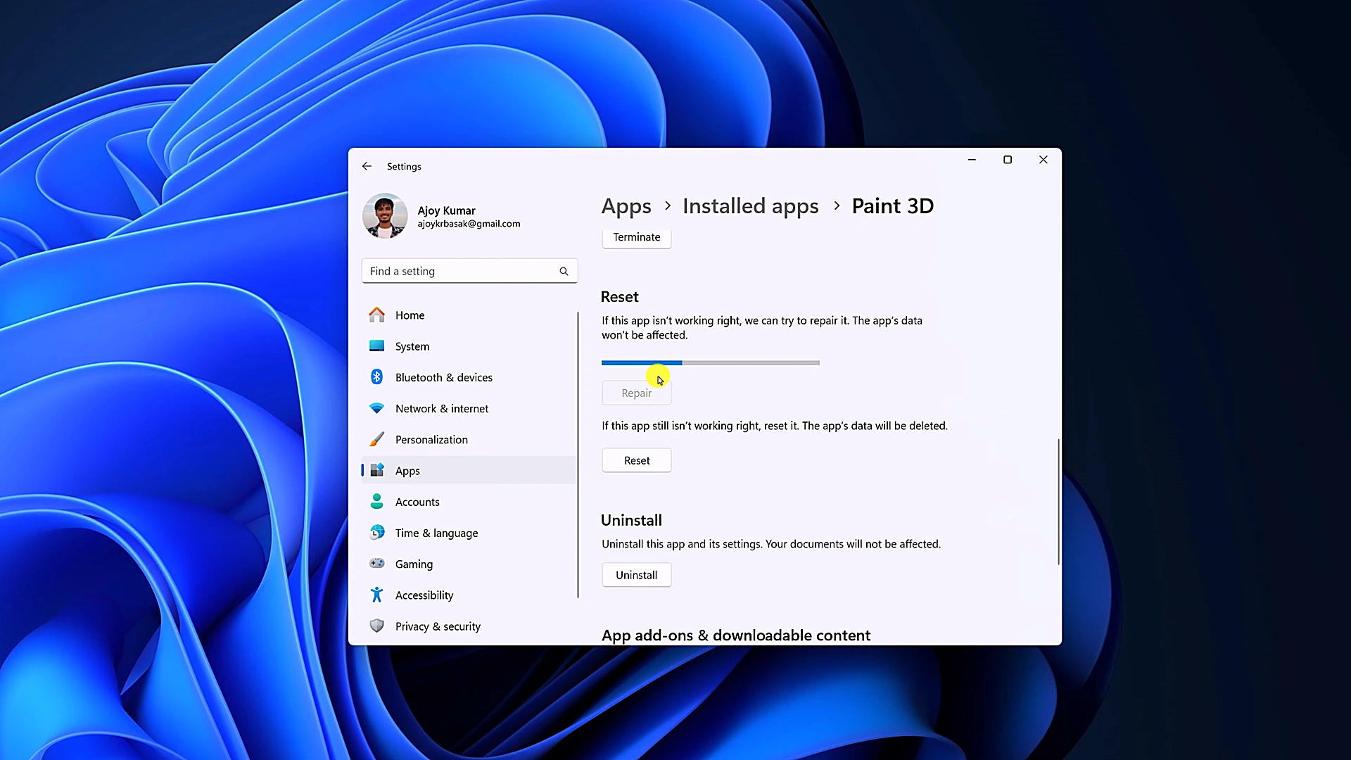 Windows 11 Settings Advanced options screen highlighting the Repair button in progress